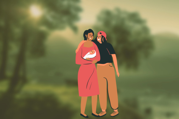 Same sex couple holding baby